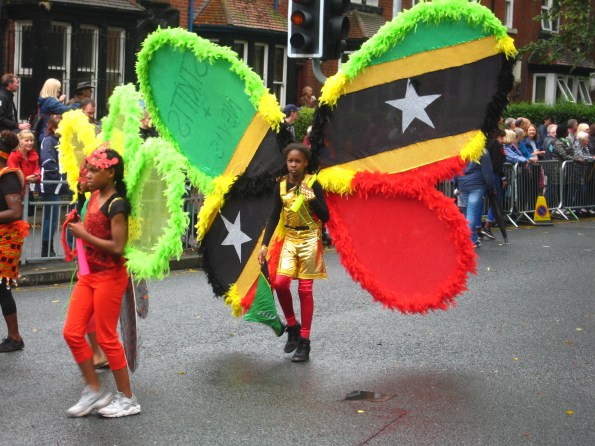 Jamaican costume at Leeds Carnival. Photo Mick Burton, continuous line artist.