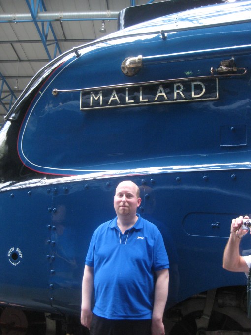 Mallard, the fastest ever steam engine, at York National Railway Museum along with my son Matthew. Photo Mick Burton, continuous line artist.